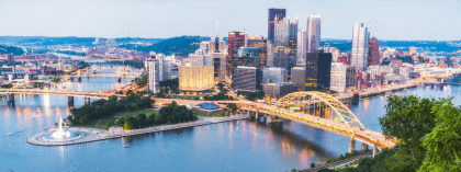 Pennsylvania skyline at dusk with silhouetted skyscrapers.